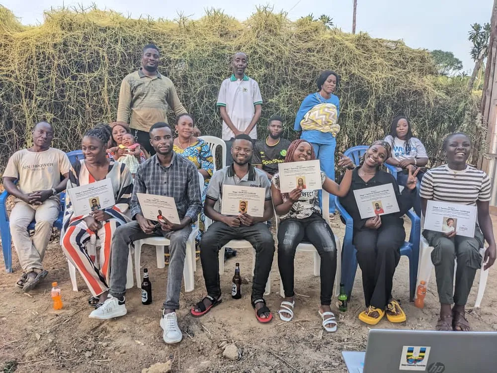 The UCF biochar team celebrating training certificates in Nakivale
